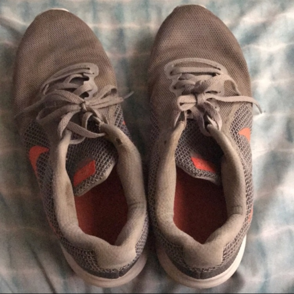Nike running shoes peach and grey
